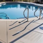 Textured anti-slip pool deck with stainless steel ladder rails