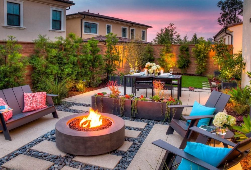 modern concrete patio with firepit